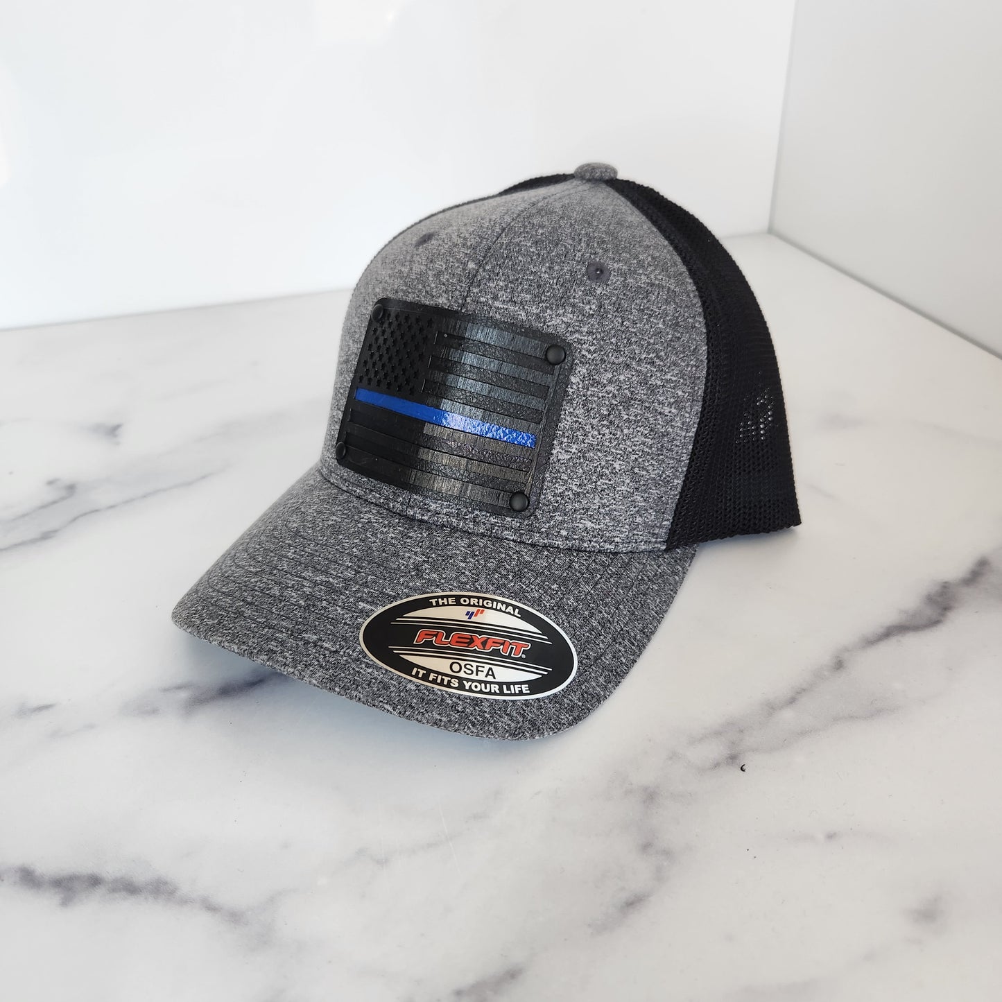 Flex Fit Trucker Hat with Black Blue Line Flag Wooden Patch