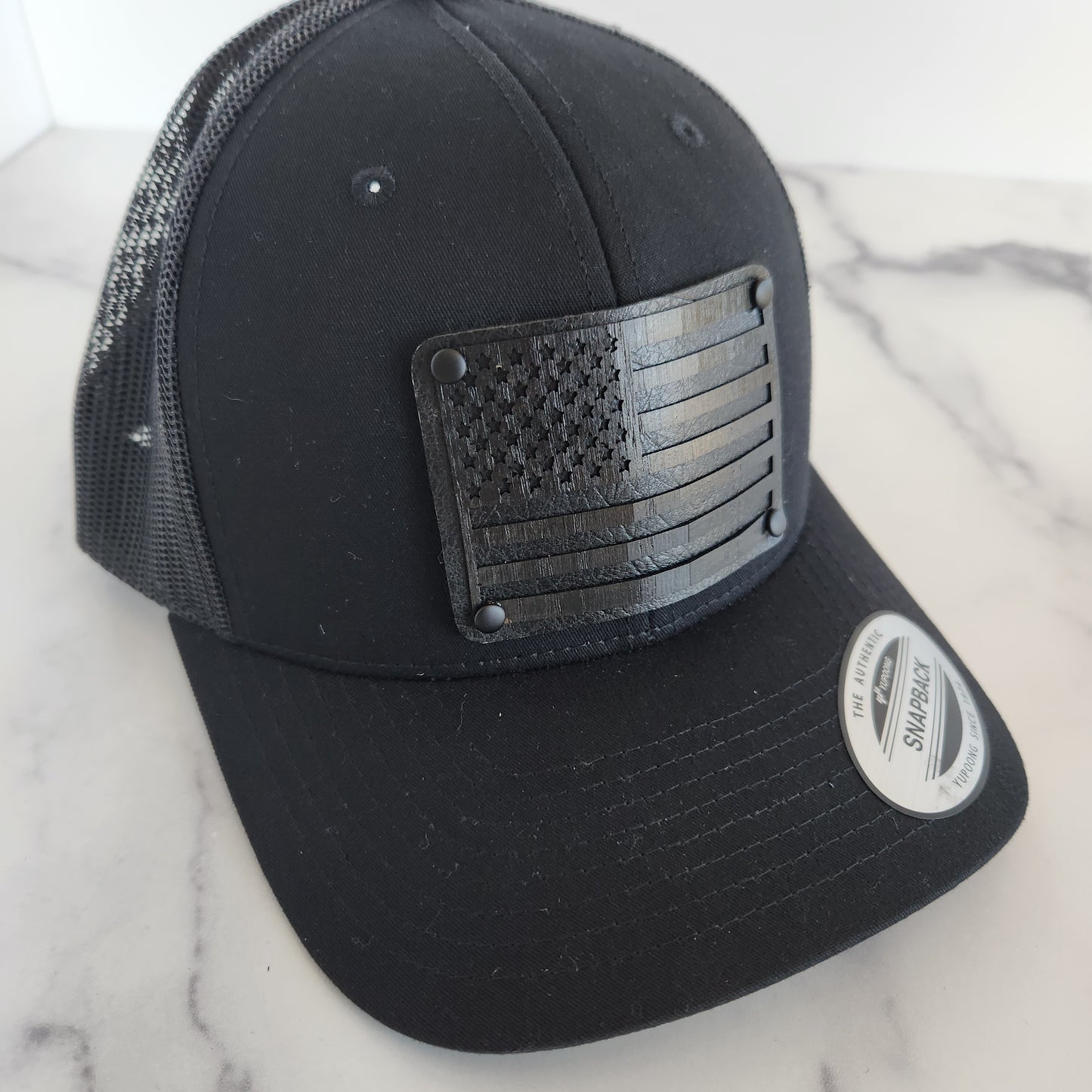 Flex Fit Trucker Hat with Black Flag Wooden Patch